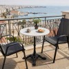 Τραπέζι μαρμάρινο Ancara pakoworld μαντέμι σε λευκή-μαύρη απόχρωση Φ70x70.8εκ